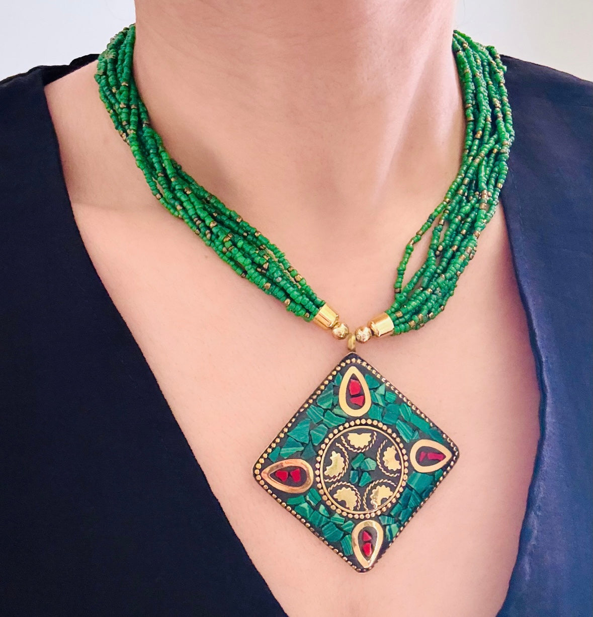 Handcrafted beaded necklace with natural stone beads and gold-plated clasp