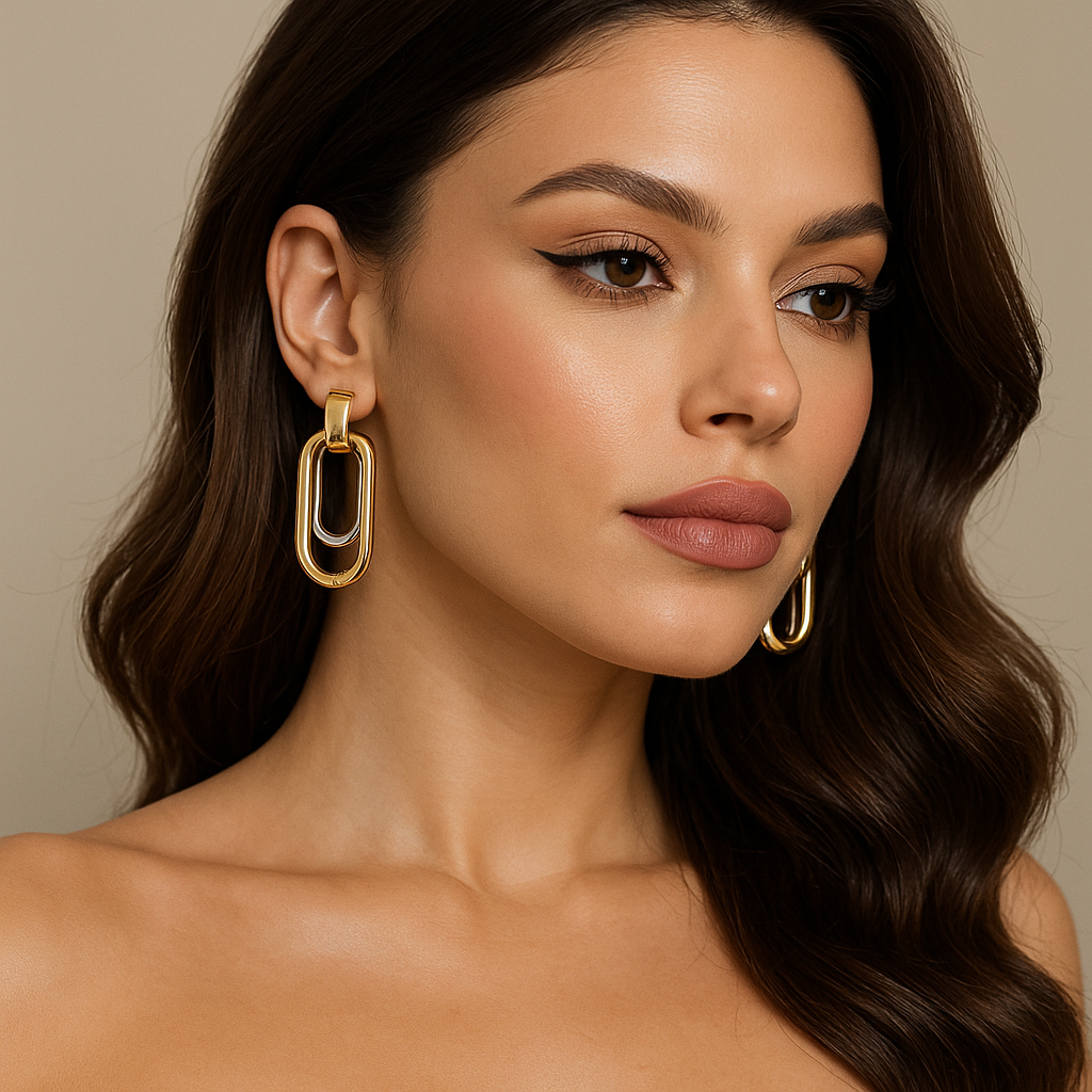 Two-tone gold and silver drop earrings with brushed metallic finish