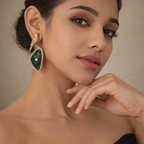 Vintage green bird-shaped dangle earrings with intricate artisan detailing