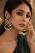 Handcrafted green stone drop earrings with gold-plated setting by Indus Threads