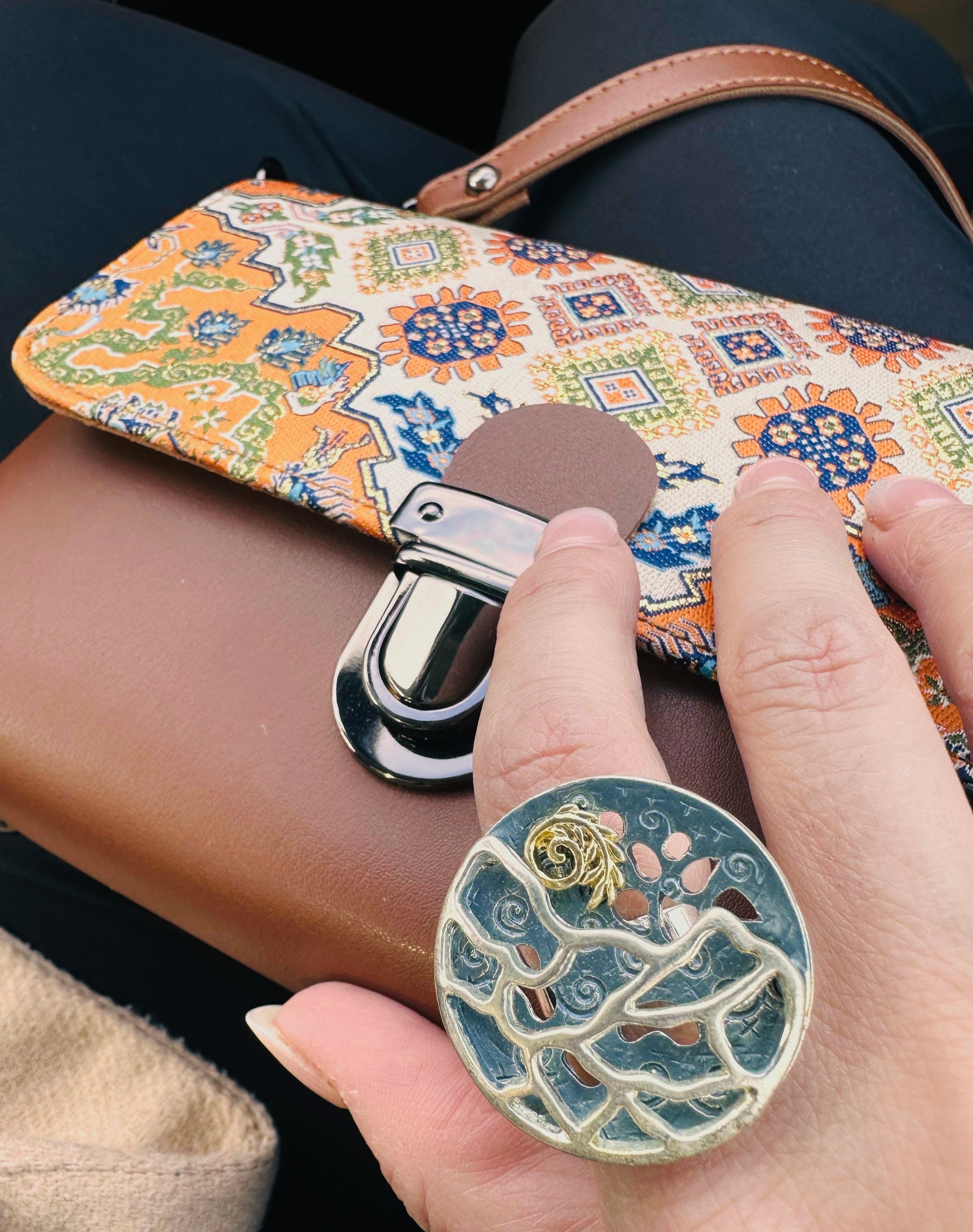 Hand-painted artisan ring with miniature floral design and gold-plated band