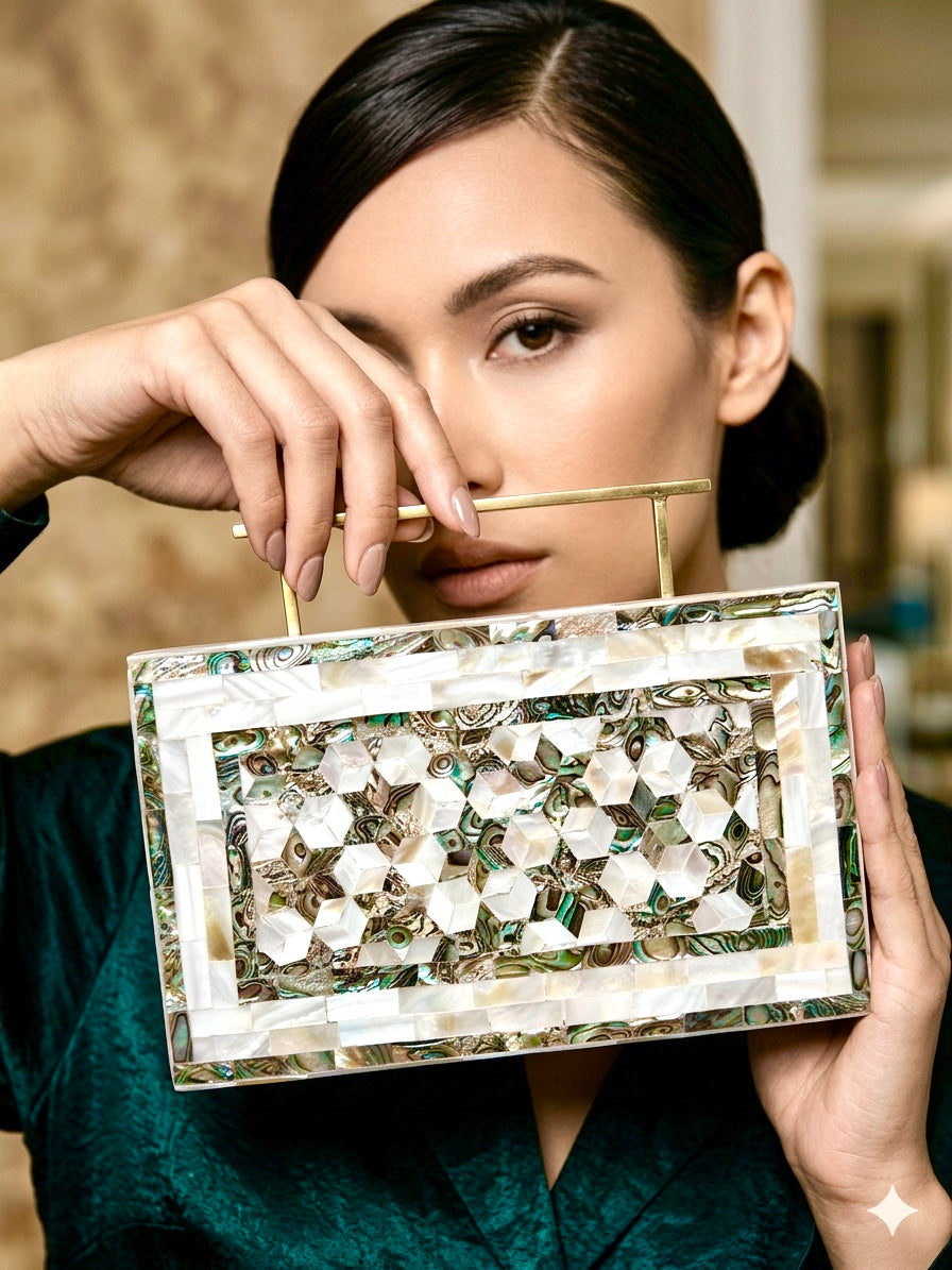 Handcrafted mother of pearl clutch bag with geometric mosaic pattern and gold handle