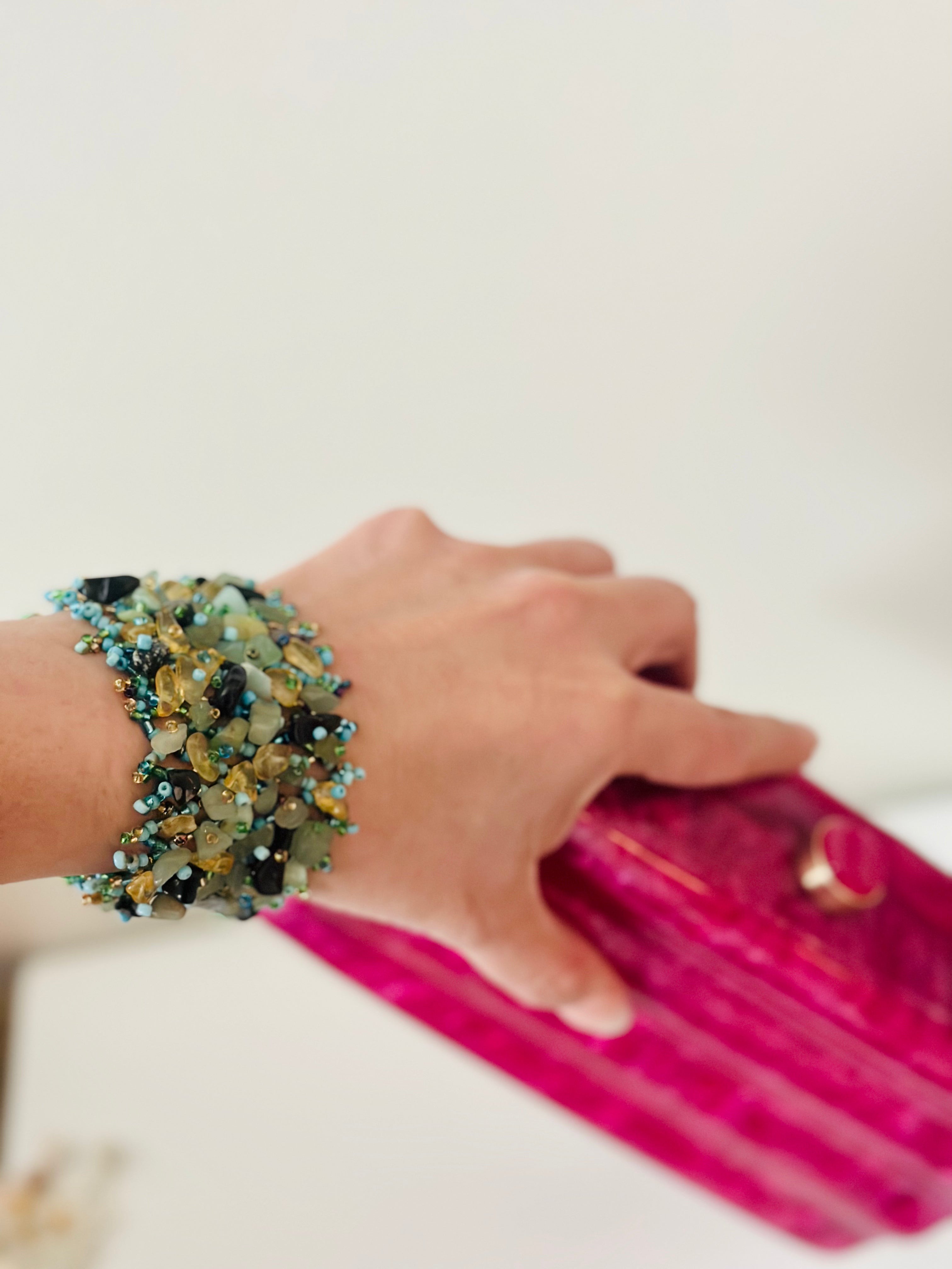 Handmade turquoise stone bracelet with natural blue-green beads and stretch cord