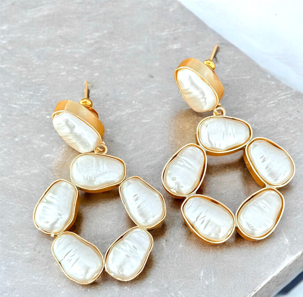 Baroque-style drop earrings with ornate gold-plated design and pearl accents