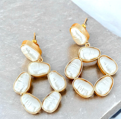 Baroque-style drop earrings with ornate gold-plated design and pearl accents