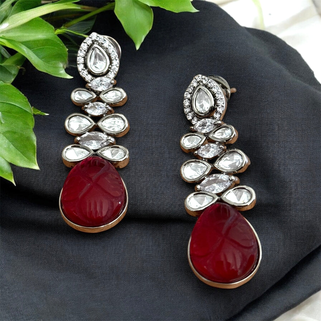 Kundan drop earrings with traditional stone setting and gold-plated frame