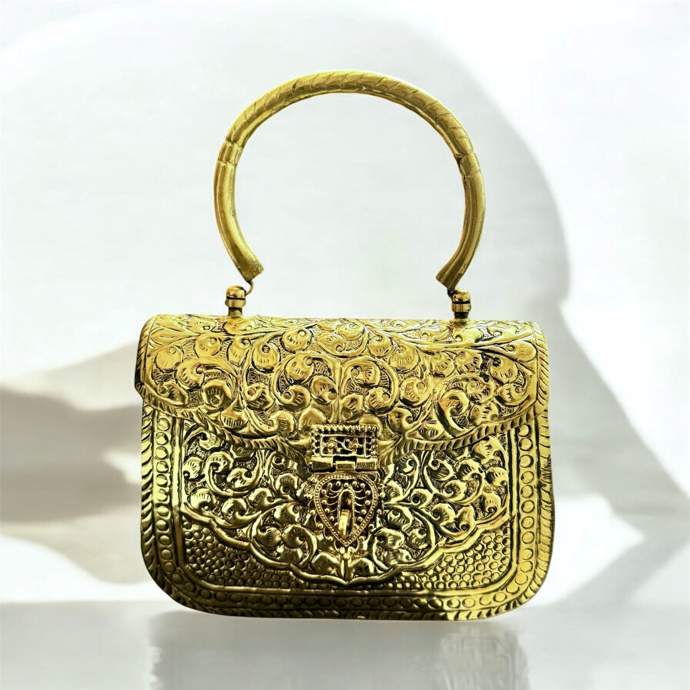 Gold mosaic handbag with metallic patchwork design and top handle