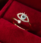 Evil eye ring with 18k gold plating and blue enamel eye motif