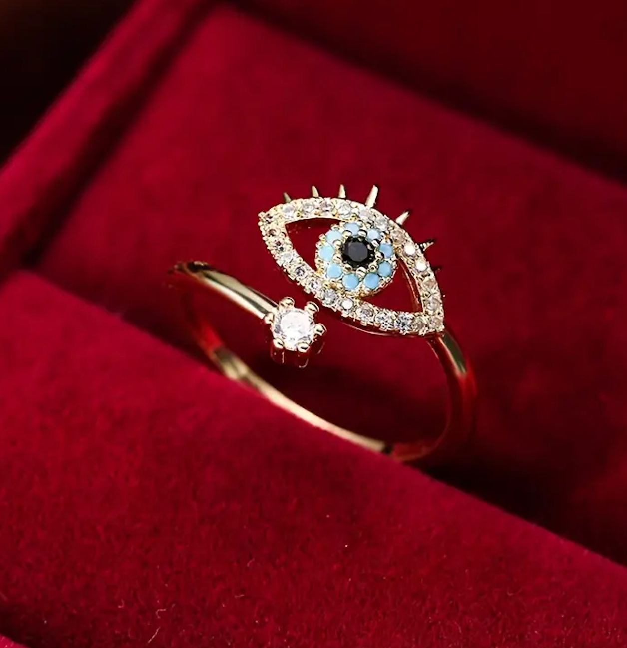 Evil eye ring with 18k gold plating and blue enamel eye motif