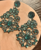 Blue crystal dangle earrings with sapphire-toned faceted stones and gold-plated frame