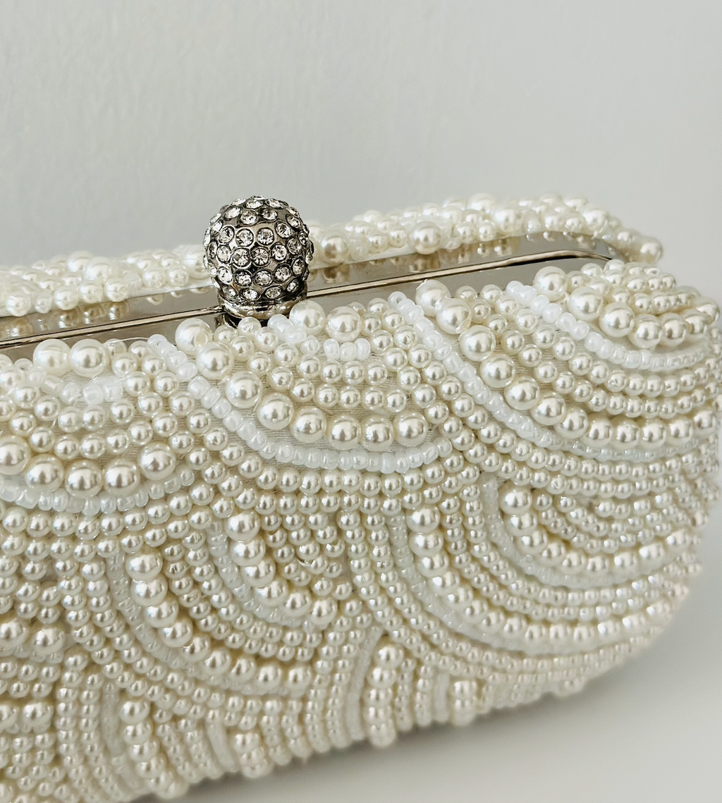 Pixie pearl clutch with all-over pearl beading and vintage kiss-lock frame