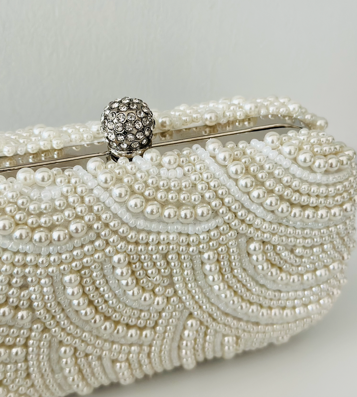 Pixie pearl clutch with all-over pearl beading and vintage kiss-lock frame
