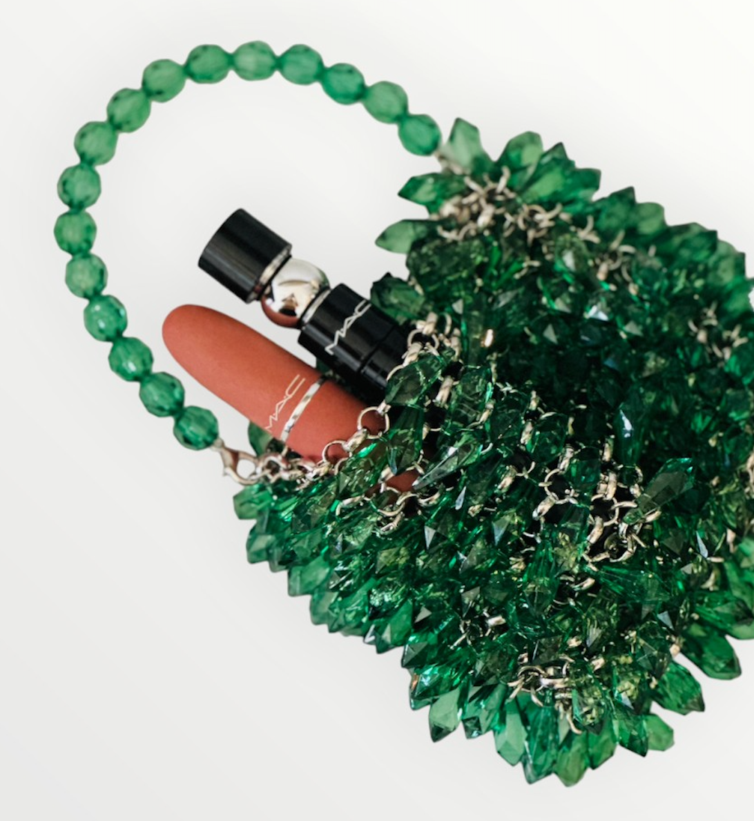 Green crystal beaded bag with emerald-toned beadwork and structured frame
