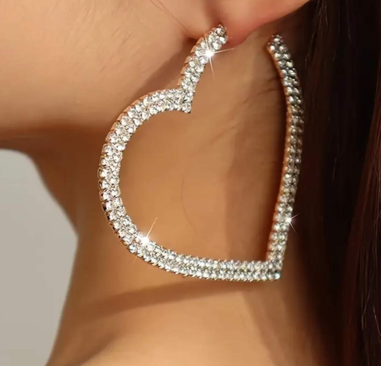 Rhinestone heart earrings with crystal-encrusted heart shape and gold-plated hooks