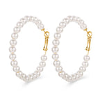 White pearl floral earrings with petal-shaped design and gold-plated studs