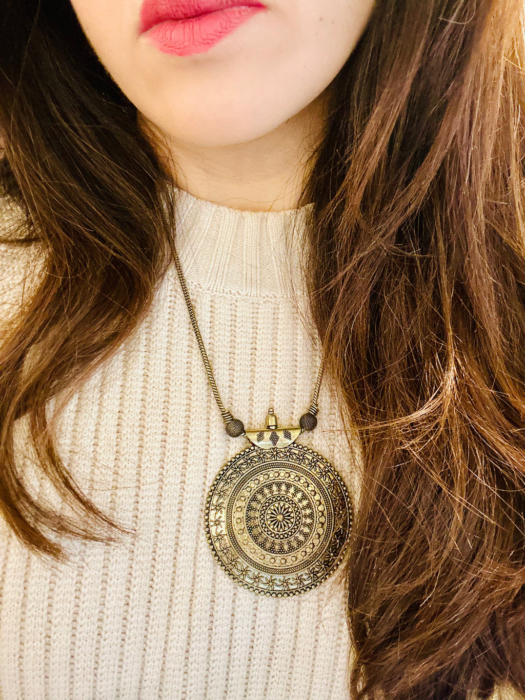 Sunburst silver pendant necklace with radial sun design and sterling chain